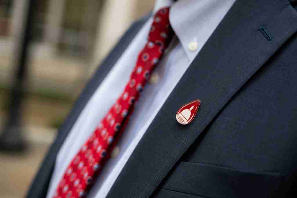 Close up of blood drop pin
